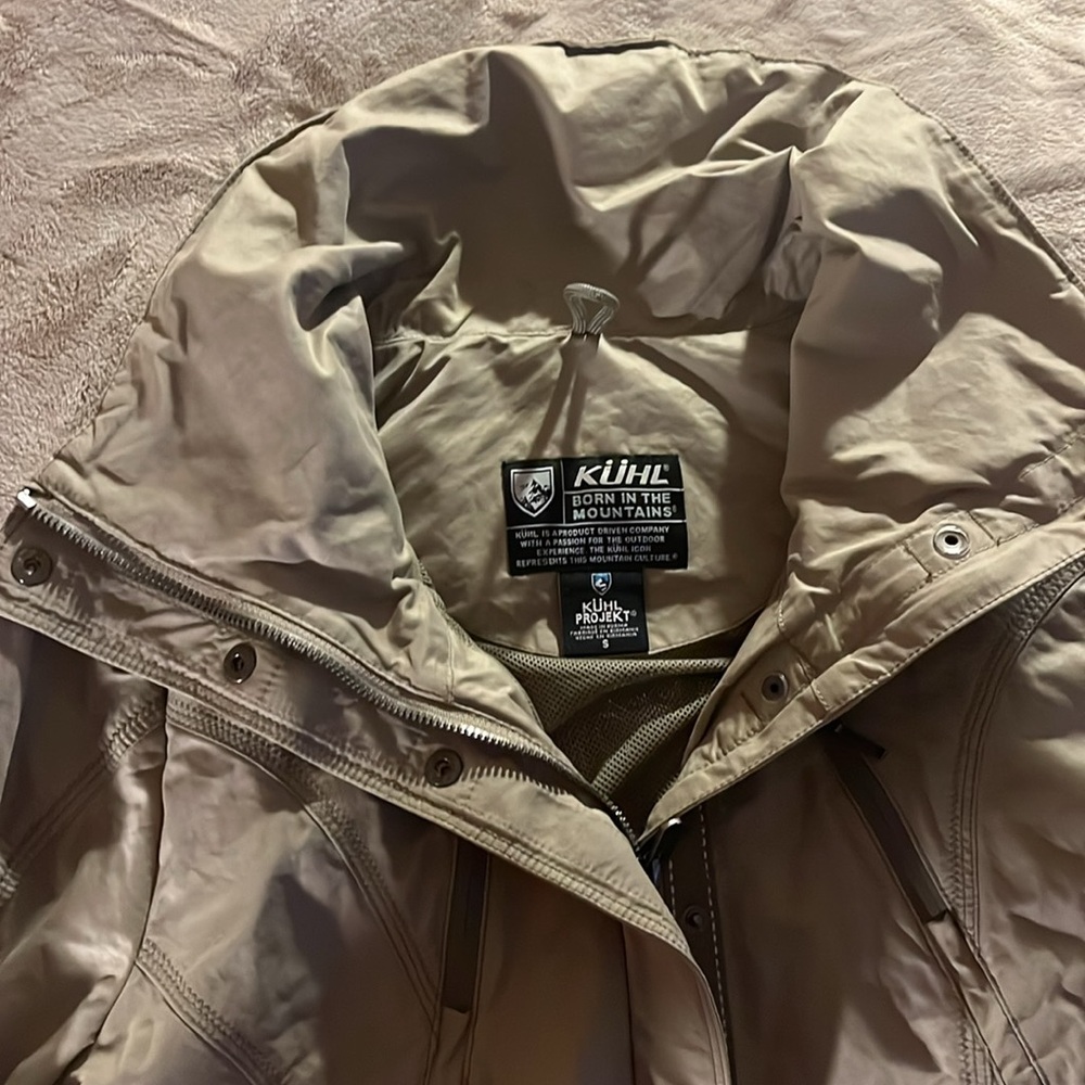 Kuhl jacket. Size S. tailored. 4 pockets. zipper on sleeves.